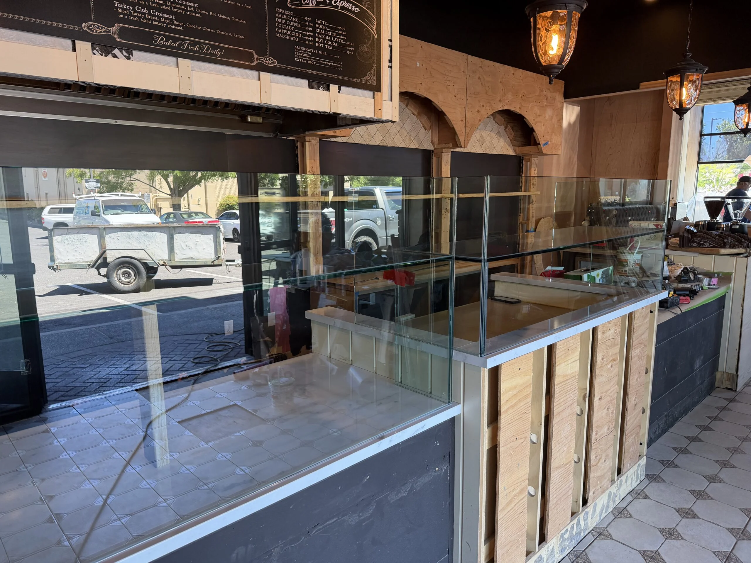 Restaurant counter with clear glass guard panels
